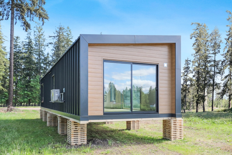 A small home in a backyard.